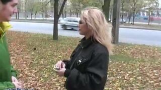 A blonde in laced stockings and boots comes to have sex for money