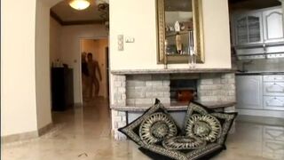 Nasty blonde with fake tits fucked on the floor in front of a fireplace