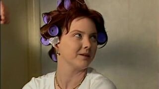 Guy rams redhead on leather couch