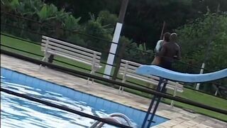 Young cocksucker sucks and fucks black cock by the pool