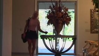 Redhead in latex drilled in her ass