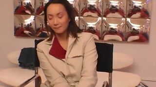 Asian whore takes it in the ass